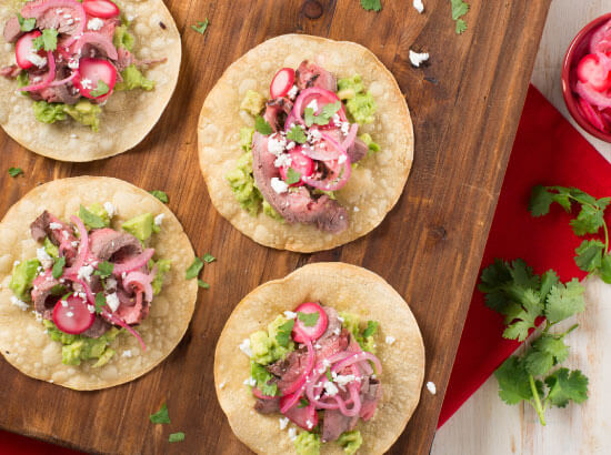 Flank Steak Tostadas with Pickled Radish and Red Onion